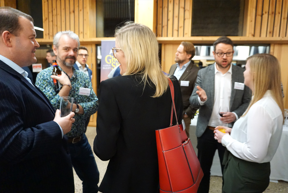 People standing around chatting