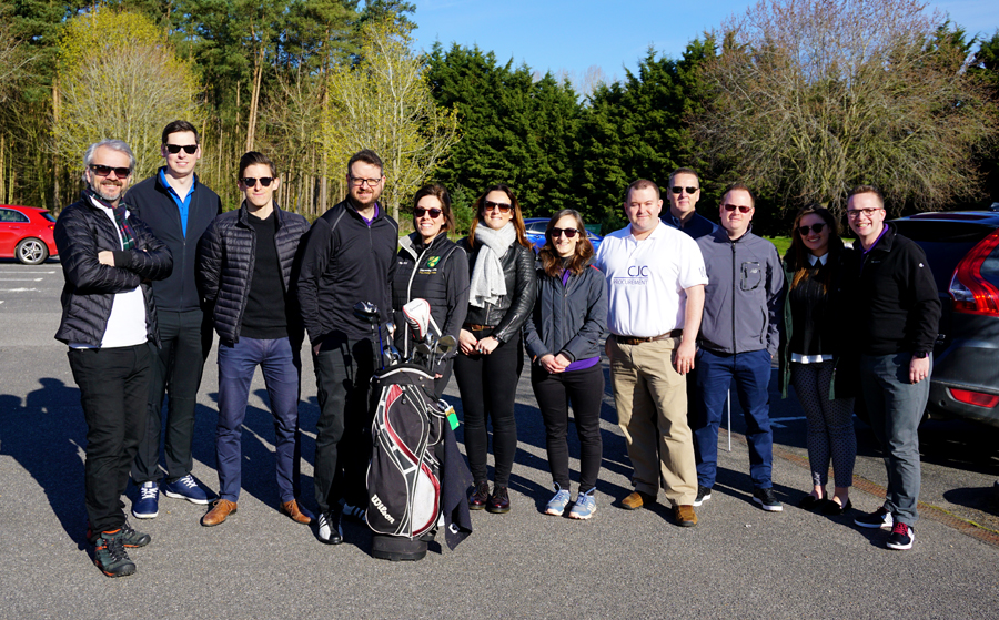 Group of people standing in the sun